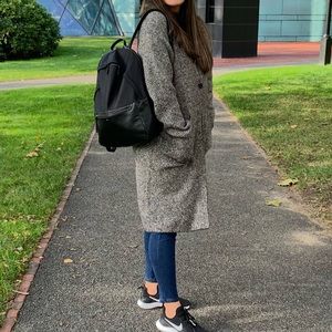 Long wool sweater with pockets